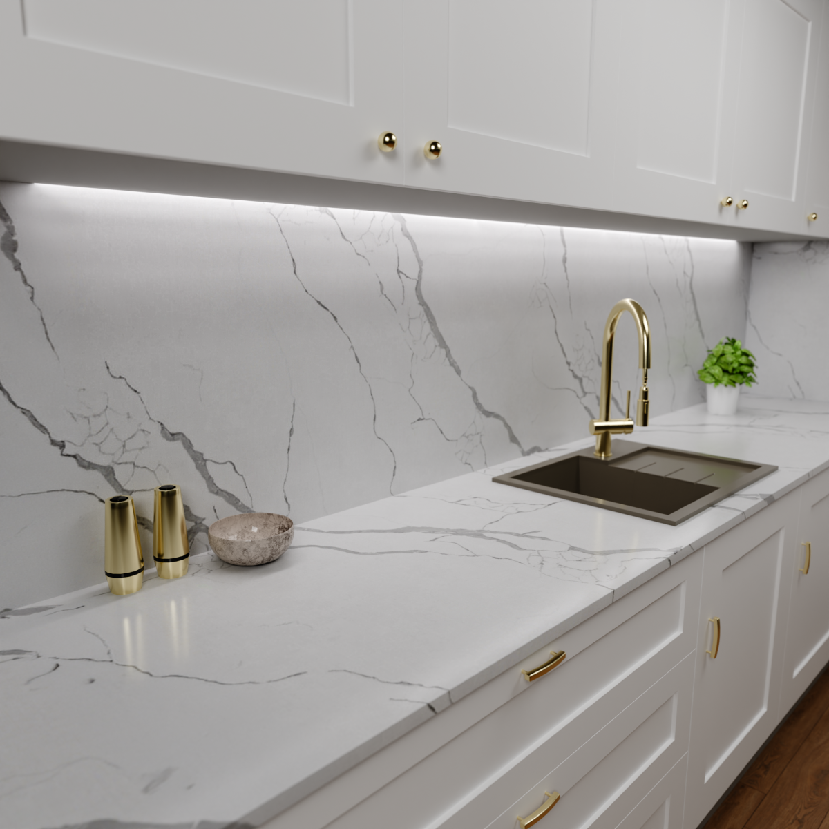 Zdjęcie przedstawia kuchnię z zamontowanym blatem kamiennym z konglomeratu kwarcowego Calacatta classic inspire czyli białego z szarymi żyłkami